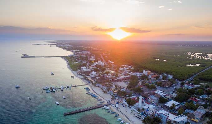 Fishermen unload their catch on the dock, Puerto Morelos