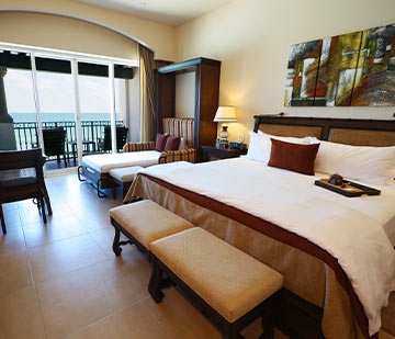 Suite en hotel all inclusive en la Riviera Maya incluye cama king size y una cama plegable