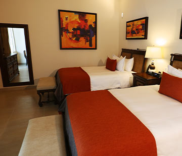 Habitación con dos camas dobles en hotel All Inclusive