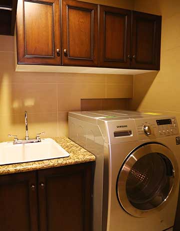 Accommodation has a Laundry room with a washing machine